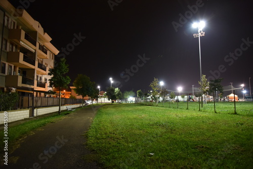 Night Public Park with Path Illuminated by Lamps
