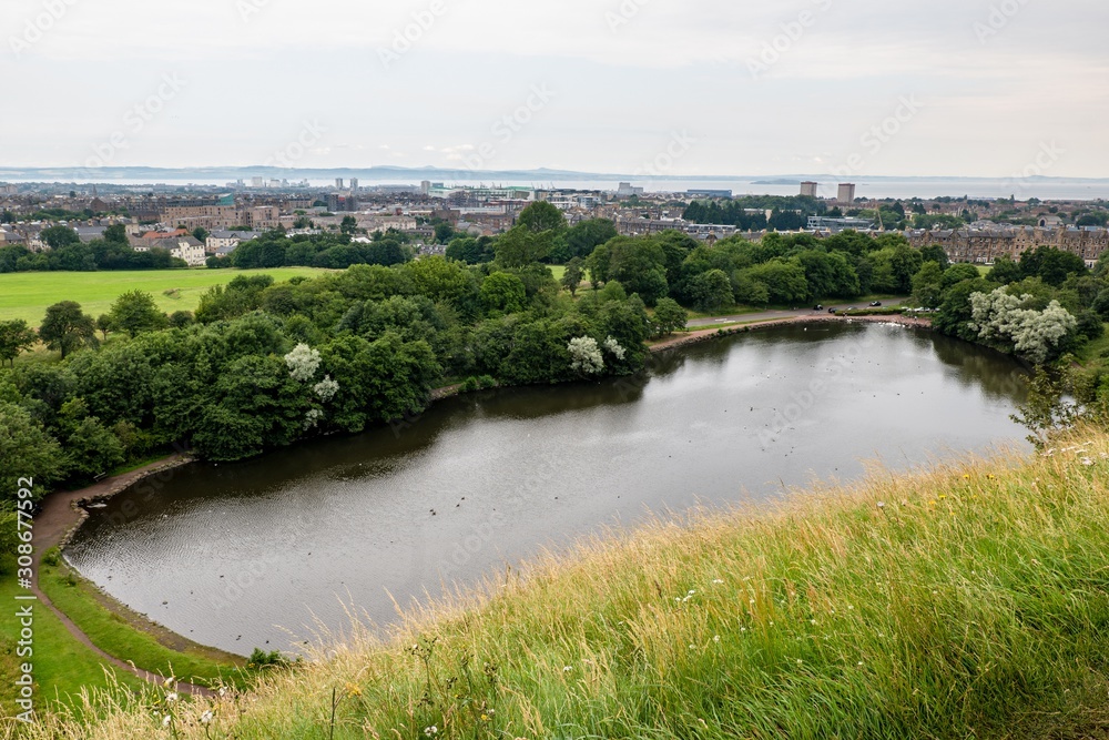 Landscape with St Margaret’s Loch from St Anthony’s Chapel in Edinburgh in Scotland and Meadowbank city