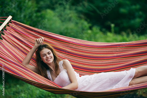 woman relaxing in hammock