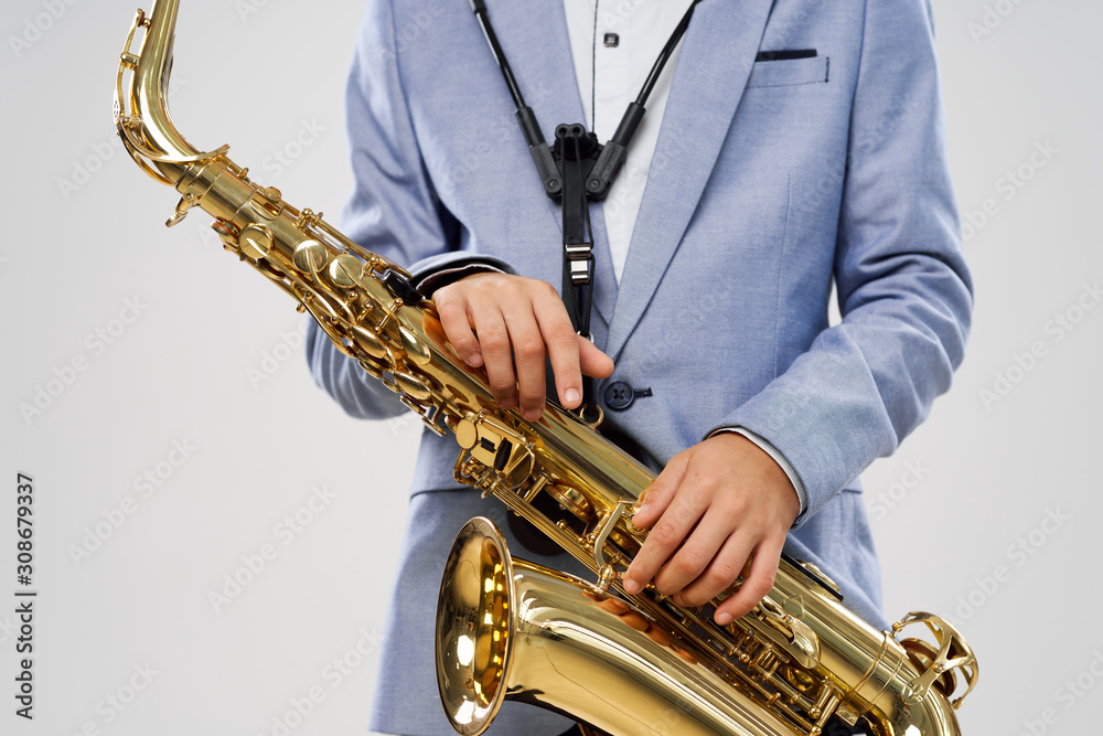 Naklejka premium man playing the saxophone