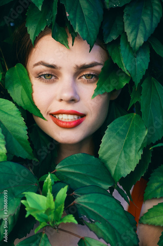 beautiful woman green leaves luxury of nature
