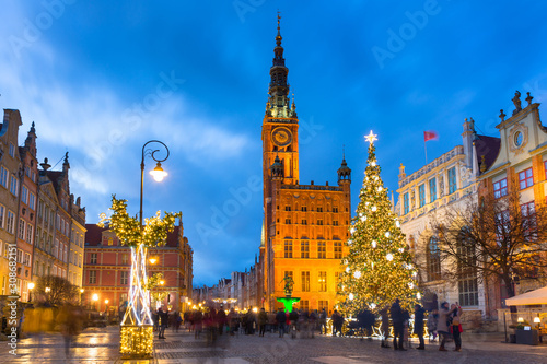 Long Lane and town hall in Gdansk with beautiful Christmas tree at dusk, Poland