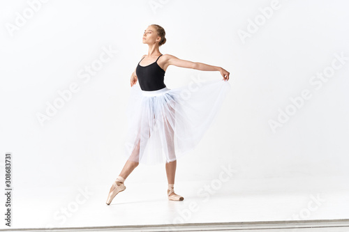 young dancer in action isolated on white