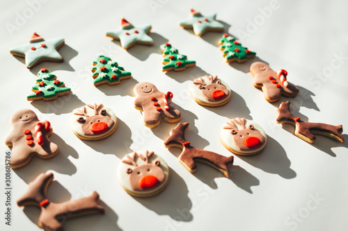 Christmas gingerbread coockies. Homemade New Year coockies on white background photo