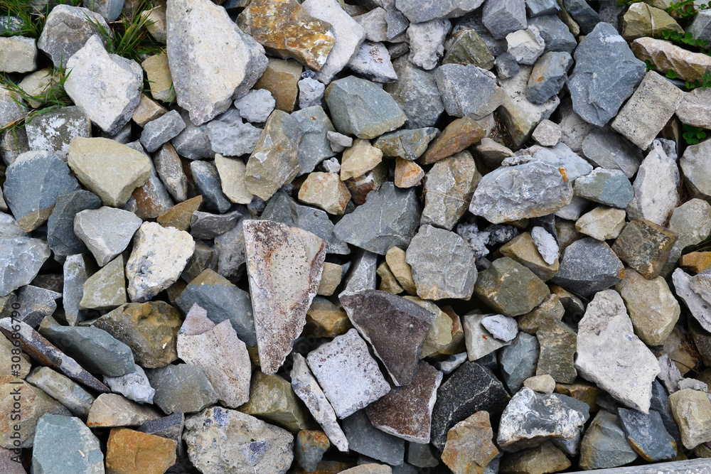 abstract background from stones covered by moss, sharp irregular stones of various types colorful abstract background from stones covered by moss, sharp irregular stones of various types colorful