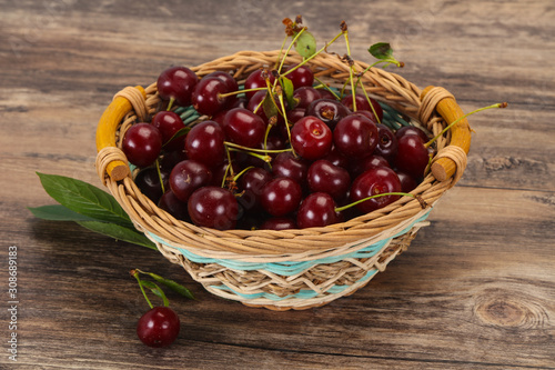 Sweet ripe cherry with leaves