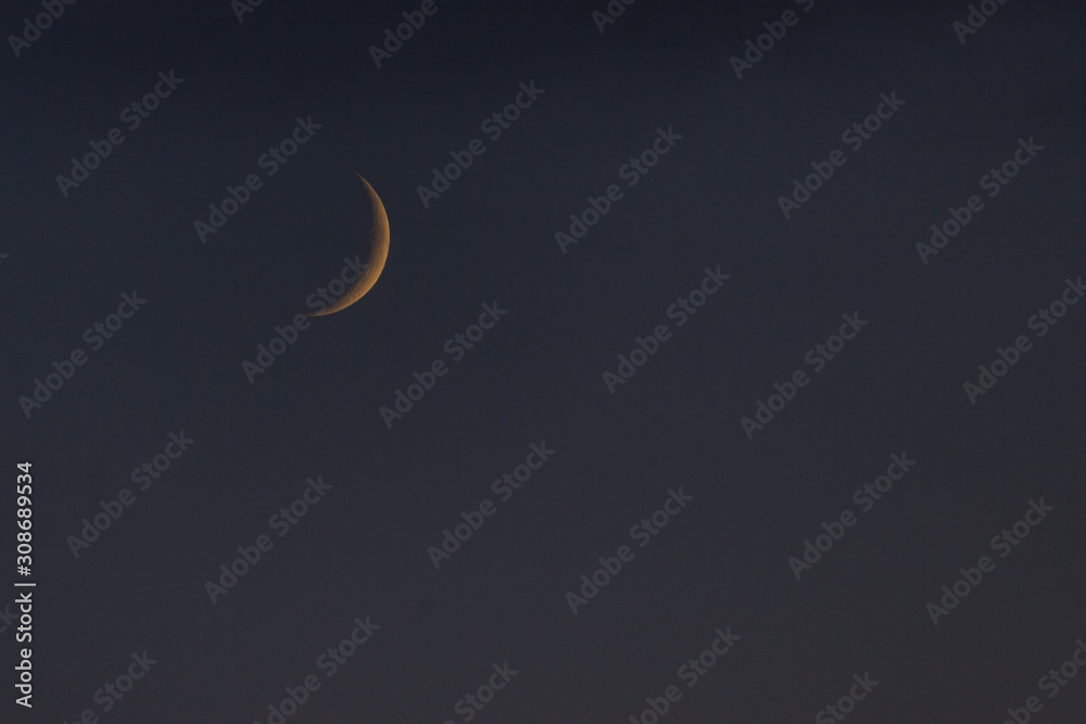 dark evening sky and half moon dark evening sky and half moon