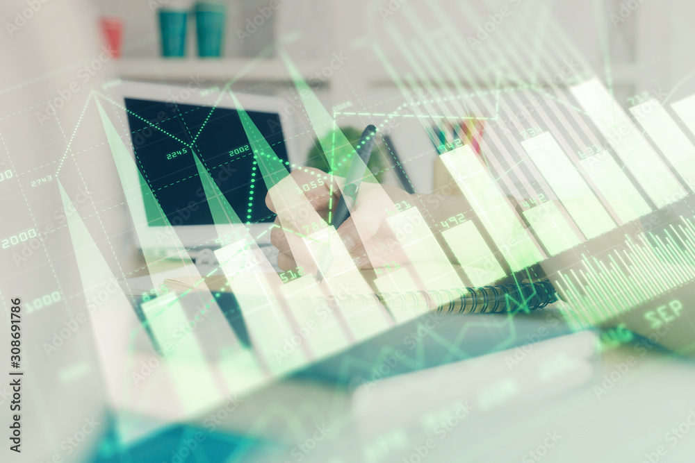 Financial graph displayed on woman's hand taking notes background. Concept of research. Double exposure Financial graph displayed on woman's hand taking notes background. Concept of research. Double exposure