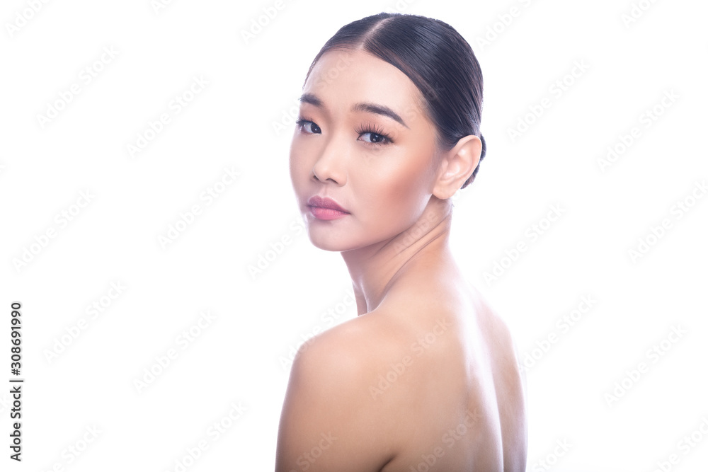Beautiful Young Asian Woman with Clean Fresh Skin isolate on white background. Spa, Face care, Facial treatment, Beauty and Cosmetics concept. Look from behind. Beautiful Young Asian Woman with Clean Fresh Skin isolate on white background. Spa, Face care, Facial treatment, Beauty and Cosmetics concept. Look from behind.
