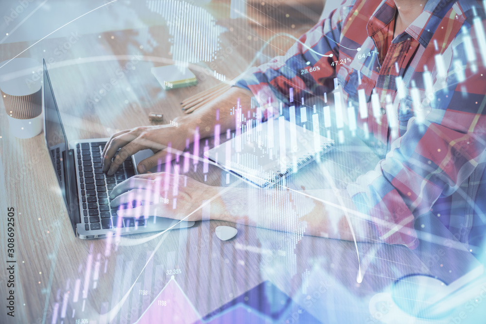 Multi exposure of forex graph with man working on computer on background. Concept of market analysis.