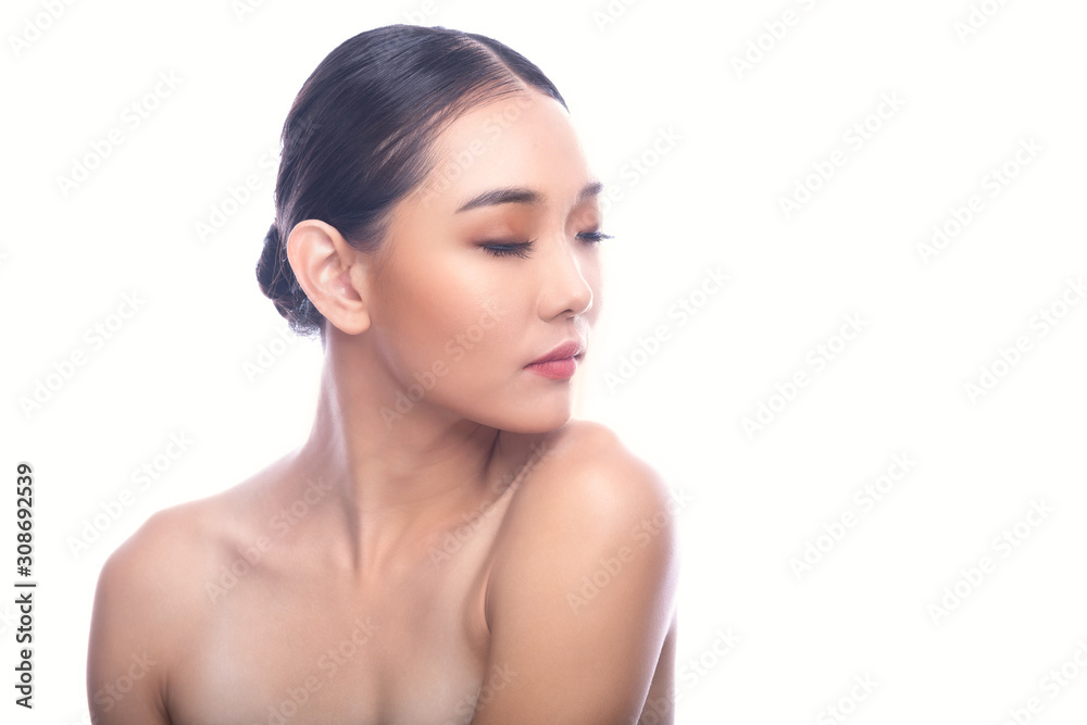 Beautiful Young Asian Woman with Clean Fresh Skin isolate on white background. Spa, Face care, Facial treatment, Beauty and Cosmetics concept. Look to right, eye close.