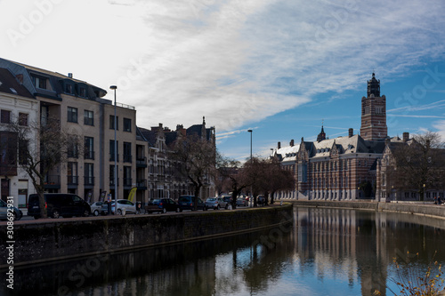 The building of the Court of First Instance, on the shore of the Old Dender river, in Dendermonde, Belgium