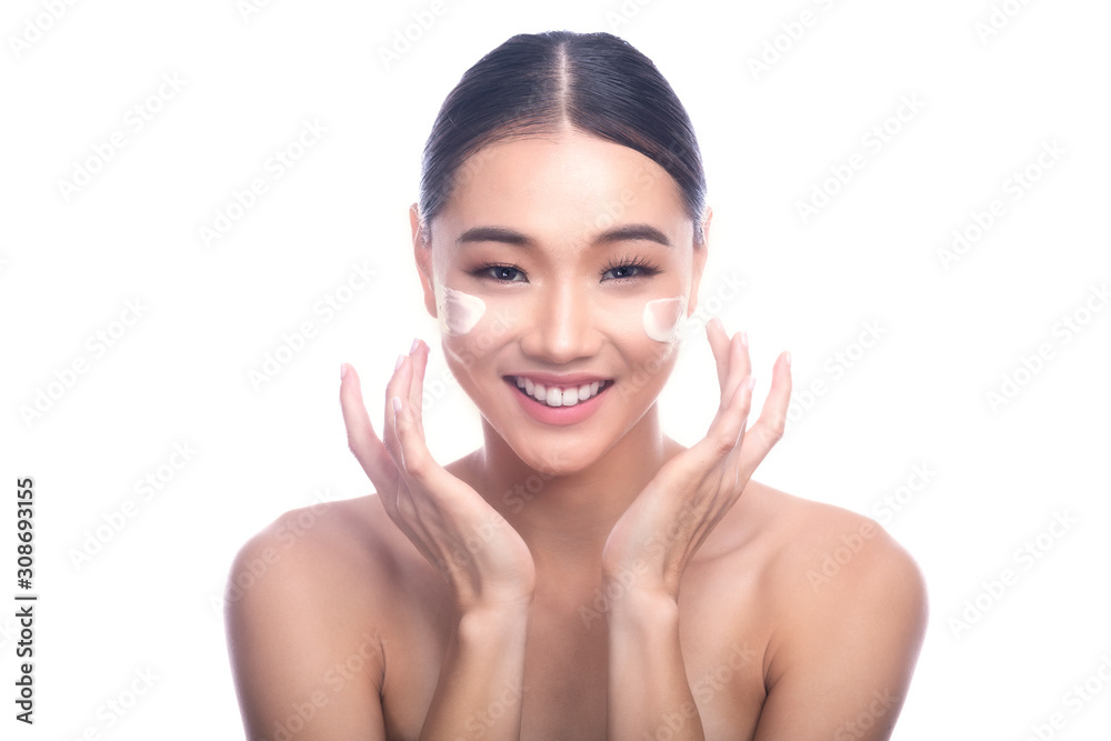 Beautiful Young Asian Woman with Clean Fresh Skin isolate on white background. Spa, Face care, Facial treatment, Beauty and Cosmetics concept. Cream on face, v shape hand, big laugh. Beautiful Young Asian Woman with Clean Fresh Skin isolate on white background. Spa, Face care, Facial treatment, Beauty and Cosmetics concept. Cream on face, v shape hand, big laugh.