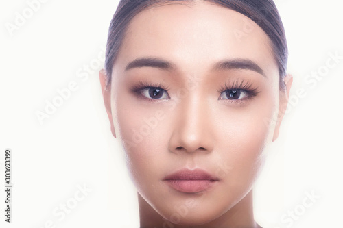 Beautiful Young Asian Woman with Clean Fresh Skin isolate on white background. Spa, Face care, Facial treatment, Beauty and Cosmetics concept. Close up face