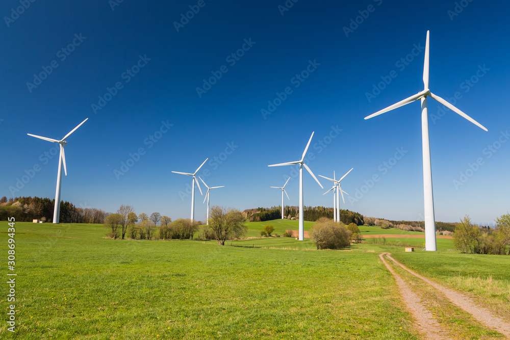 wind turbines in green field wind turbines in green field