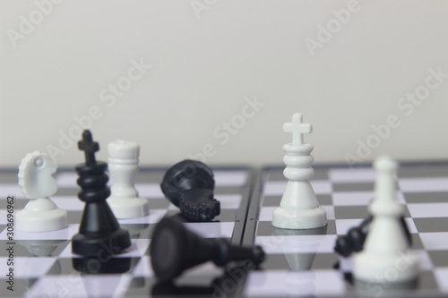 Simple Photo illustration for War  battle or politic situation concept  plastic magnetic small chess  critical situation