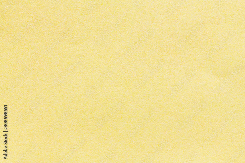 Yellow blank piece of paper. A high resolution photo of paper ideal as a background or texture. Yellow blank piece of paper. A high resolution photo of paper ideal as a background or texture.