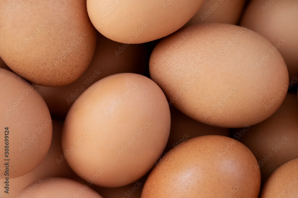 fresh chicken eggs for sale at a market. pattern background. fresh chicken eggs for sale at a market. pattern background.