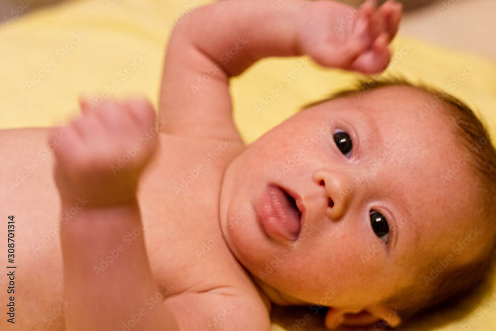 Portrait of adorable smiling newborn baby Portrait of adorable smiling newborn baby
