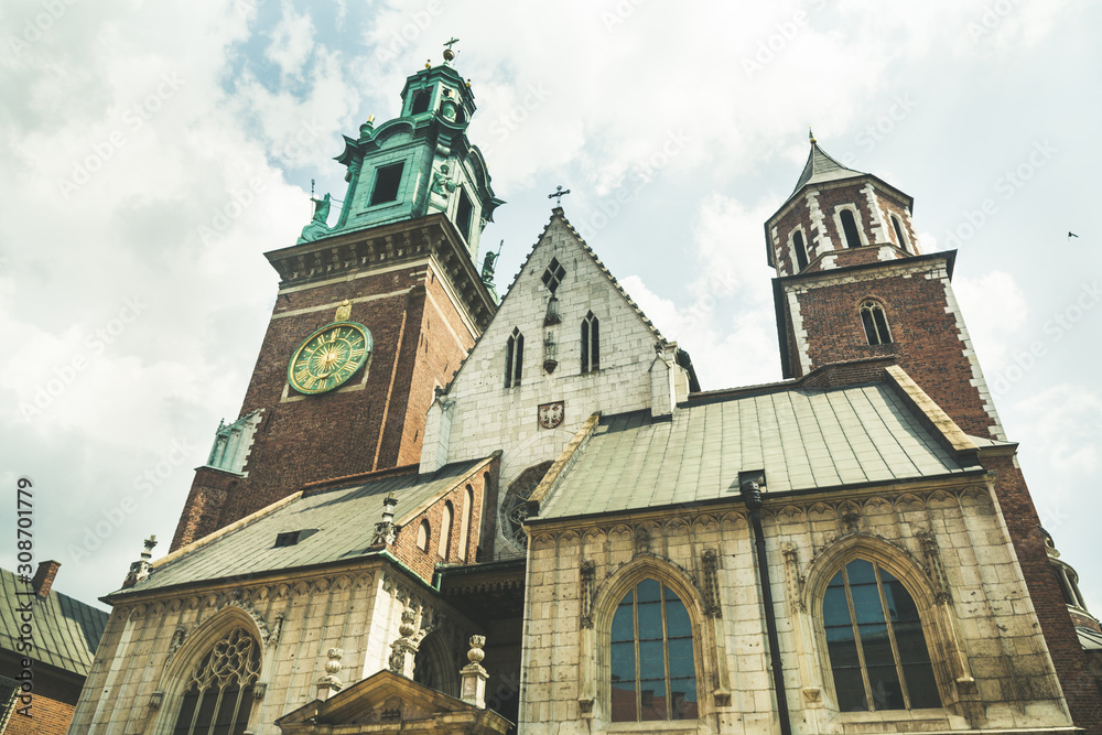 Wawel Cathedral on Wawel Hill, Sigismund's Chapel with a gold dome and Vasa Dynasty chapel in Krakow, Poland. Shot from below