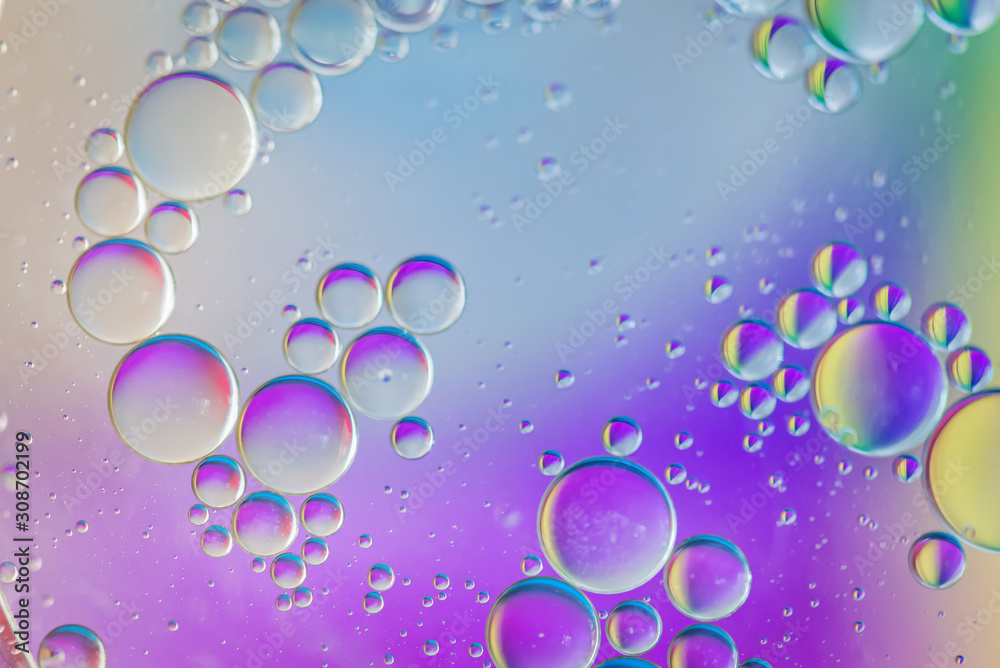 Oil drops in water. Abstract psychedelic pattern image multicolored. Abstract background with colorful gradient colors. DOF Oil drops in water. Abstract psychedelic pattern image multicolored. Abstract background with colorful gradient colors. DOF