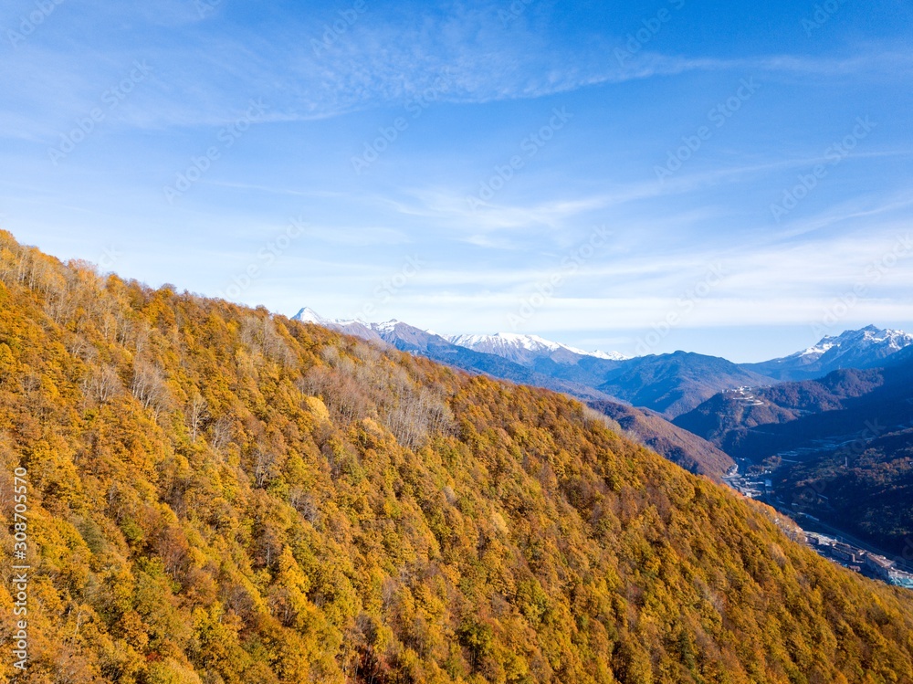Aerial view of the Caucasus mountains in autumn in Krasnaya Polyana, Russia.