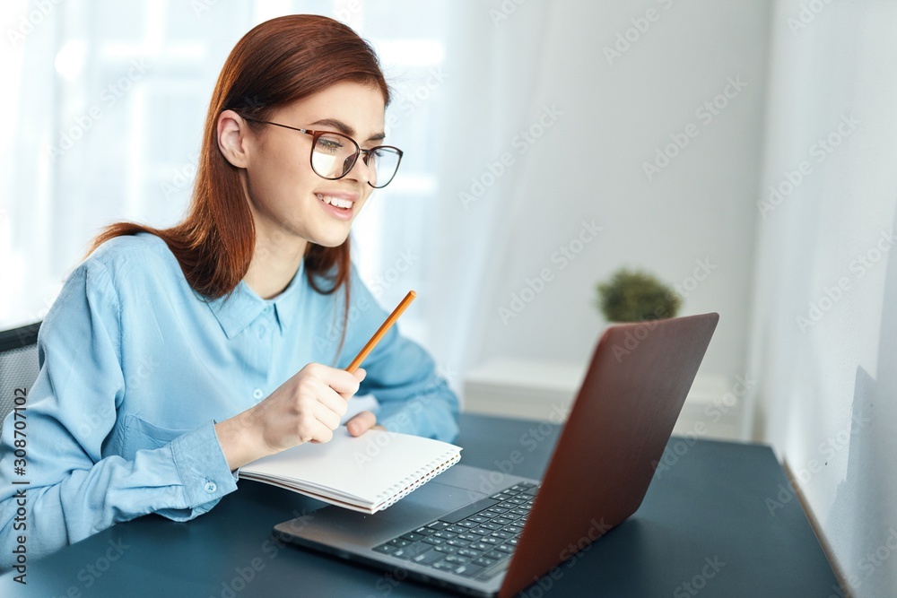 businesswoman working on laptop in office businesswoman working on laptop in office