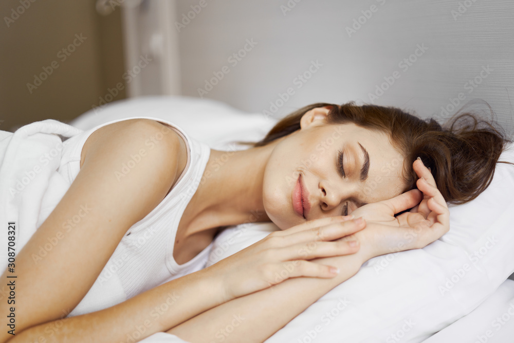 portrait of young woman lying on massage table portrait of young woman lying on massage table