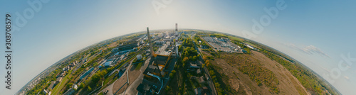 Pipes for thermal power plants in the city. 360 vr Drone shot