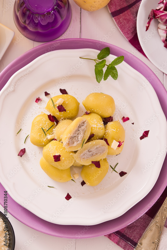 Potato gnocchi stuffed with radicchio and ricotta. Potato gnocchi stuffed with radicchio and ricotta.