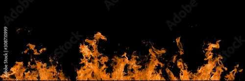 Real orange line of fire flames isolated on black background. Mockup on black of wall of fire.