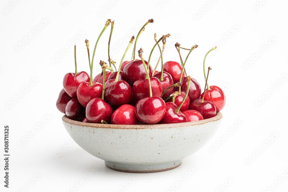 Fresh Red Cherries In A Small Round Stoneware Bowl Fresh Red Cherries In A Small Round Stoneware Bowl