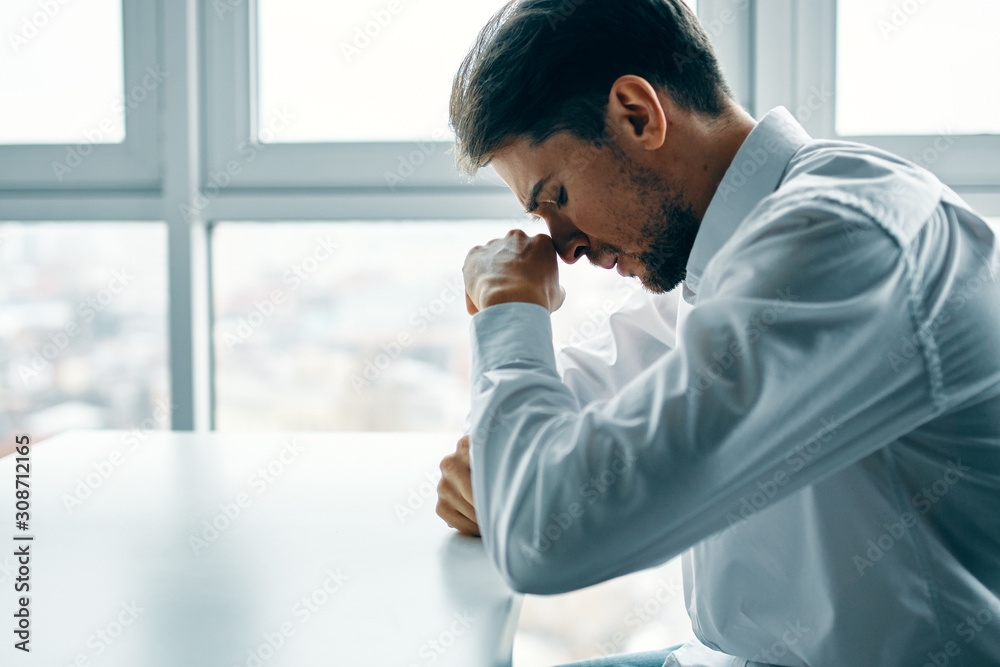 scientist looking at microscope in laboratory