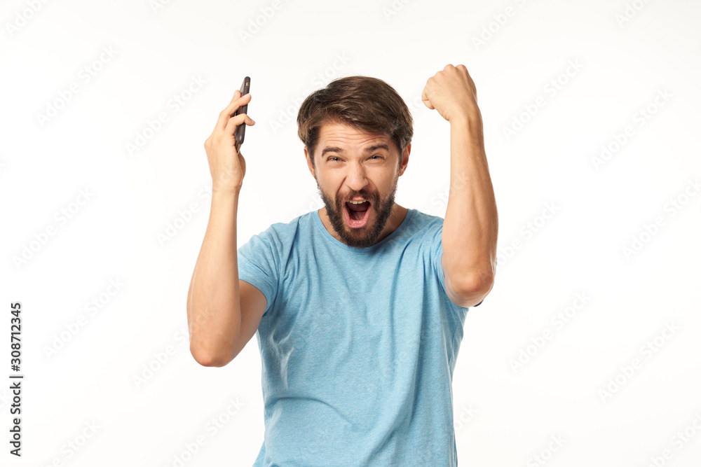 young man with arms raised young man with arms raised
