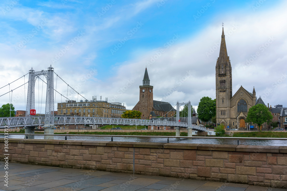 View of Greig Street Bridge with the Free North Church of Scotland in the background across the River Ness  in Inverness, Scotland