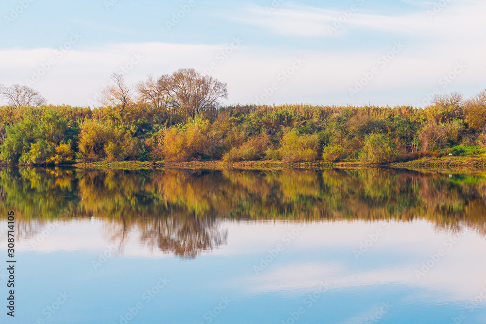 Autumn forest river reflection landscape Autumn forest river reflection landscape