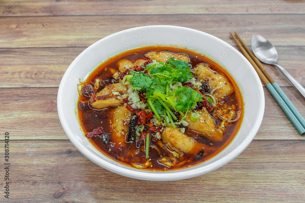 Sichuan spicy boiled fish hot pot with red hot spicy dried chilli & peppercorns. Asia China Chongqing Chengdu authentic food. Sichuan spicy boiled fish hot pot with red hot spicy dried chilli & peppercorns. Asia China Chongqing Chengdu authentic food.
