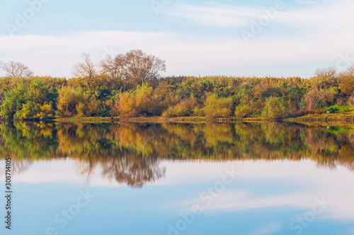 Autumn forest river reflection landscape