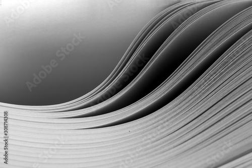 Close-up of a bending stack of paper