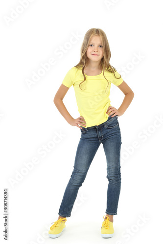 Beautiful little girl in fashion clothing isolated on white background