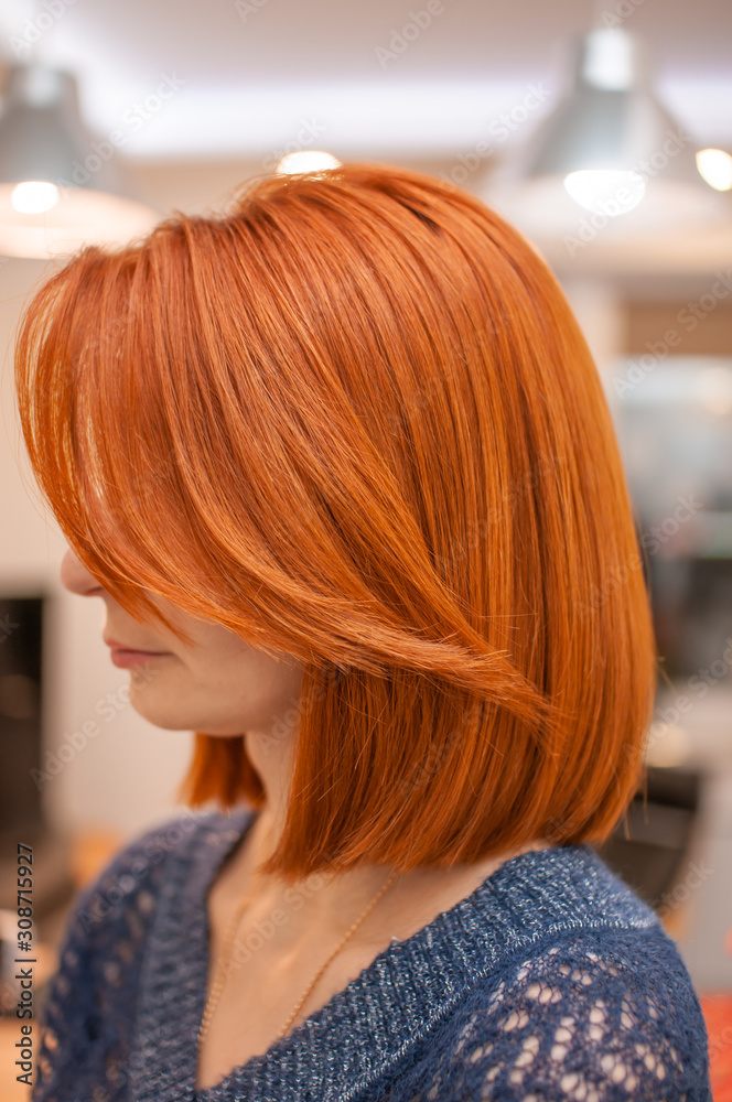 Portrait of a woman with bright red hair Portrait of a woman with bright red hair