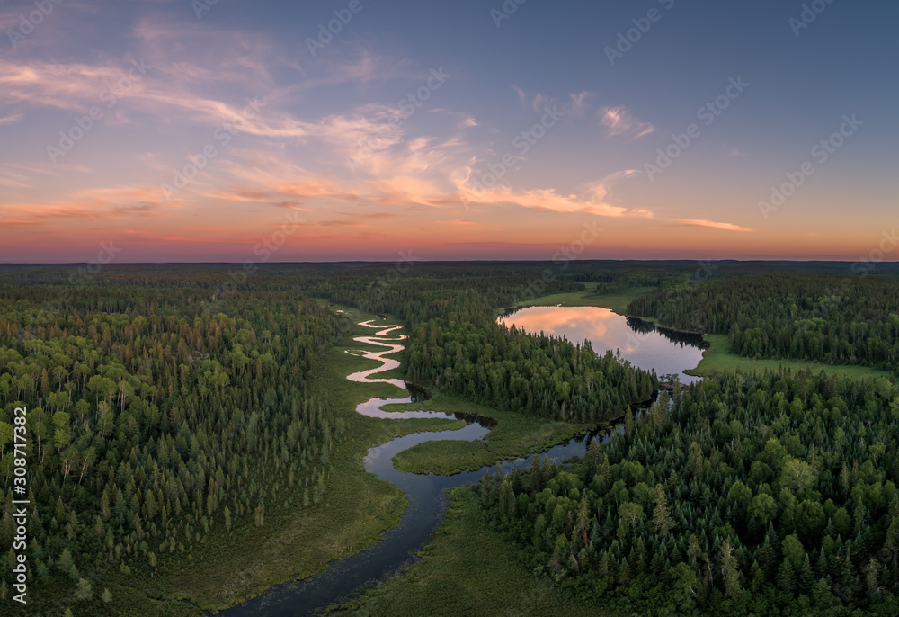 Fototapeta premium An aerial view of a winding Clearwater Creek in Northwest Ontario, Canada.