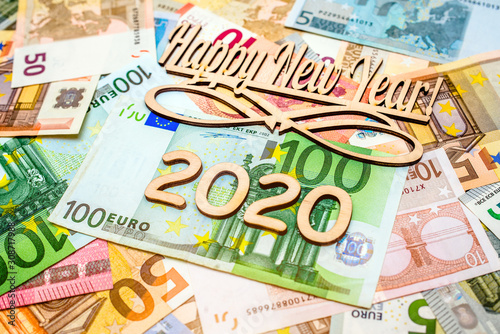 Happy new year 2020 against the background of the Euro currency
