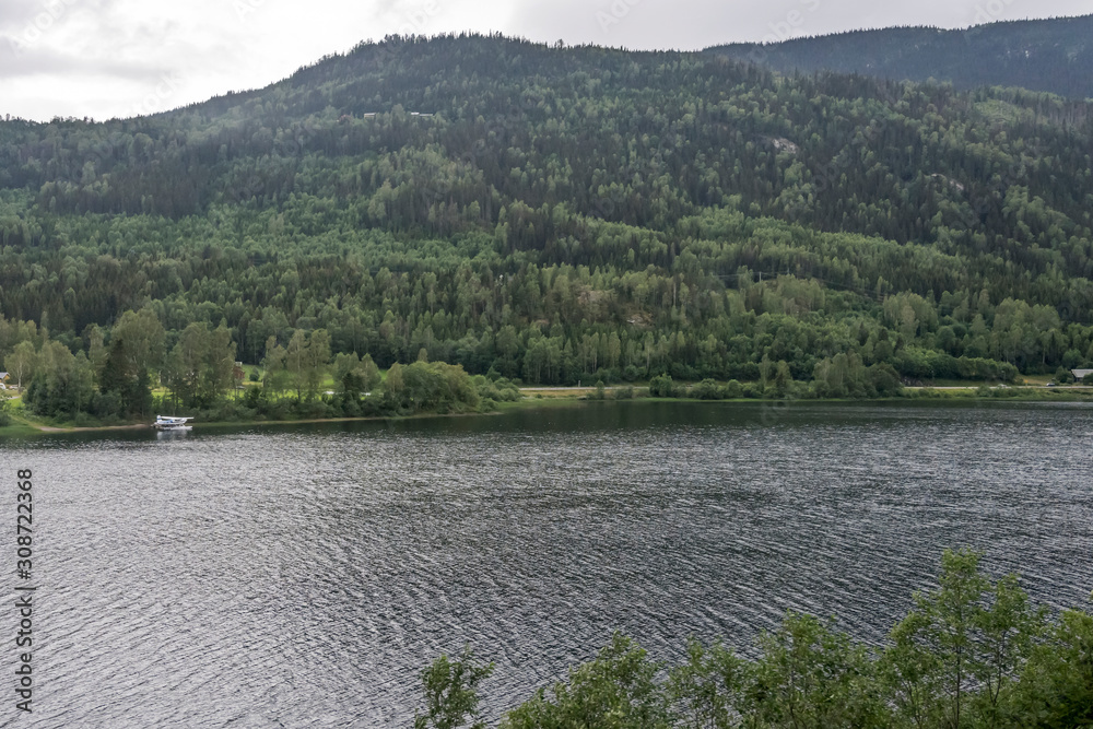 seaplane moored in green river valley, near Fla, Norway seaplane moored in green river valley, near Fla, Norway