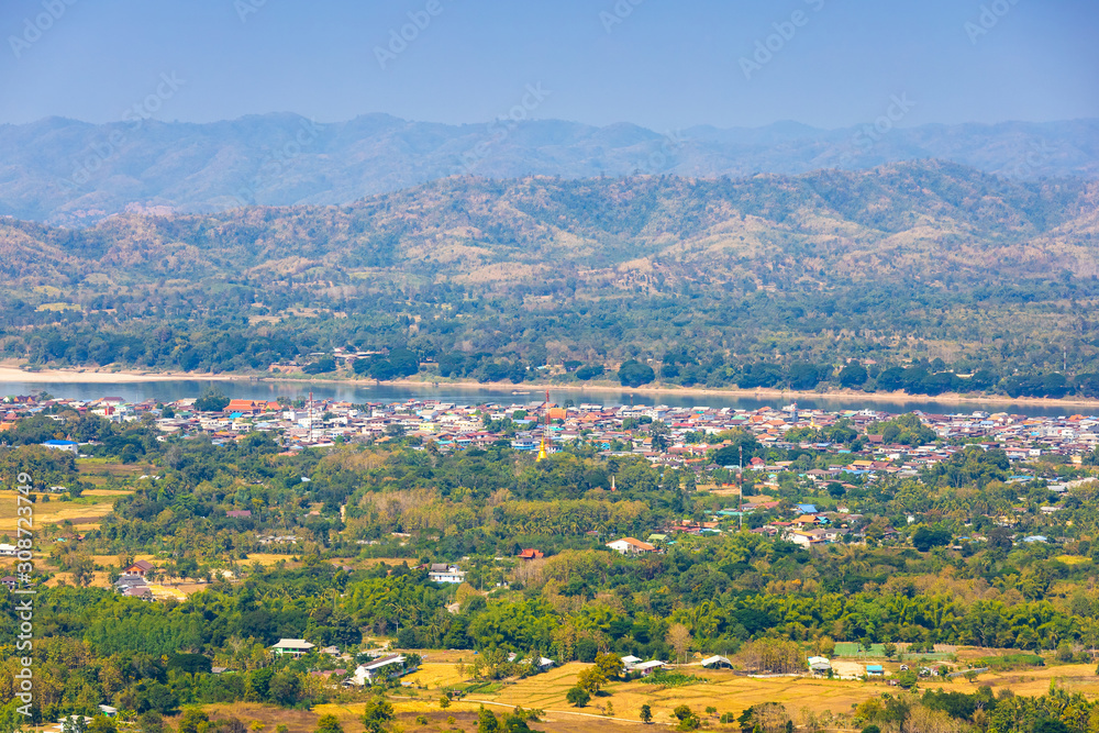 Beautiful panoramic view of Mae Khong river Mountain views of Laos with Chiang Khan town on Phu Thok Park in Loei province,Thailand