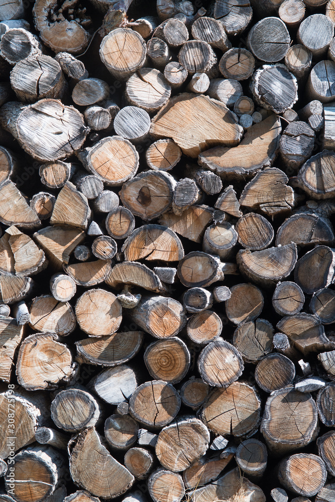 Stack of firewood, wooden abstract background. Stack of firewood, wooden abstract background.