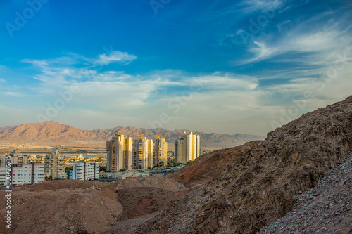 Israeli city Eilat outskirts landmark view from sand stone desert rocks scenic dry landscape environment in Middle East Gulf of Aqaba region 