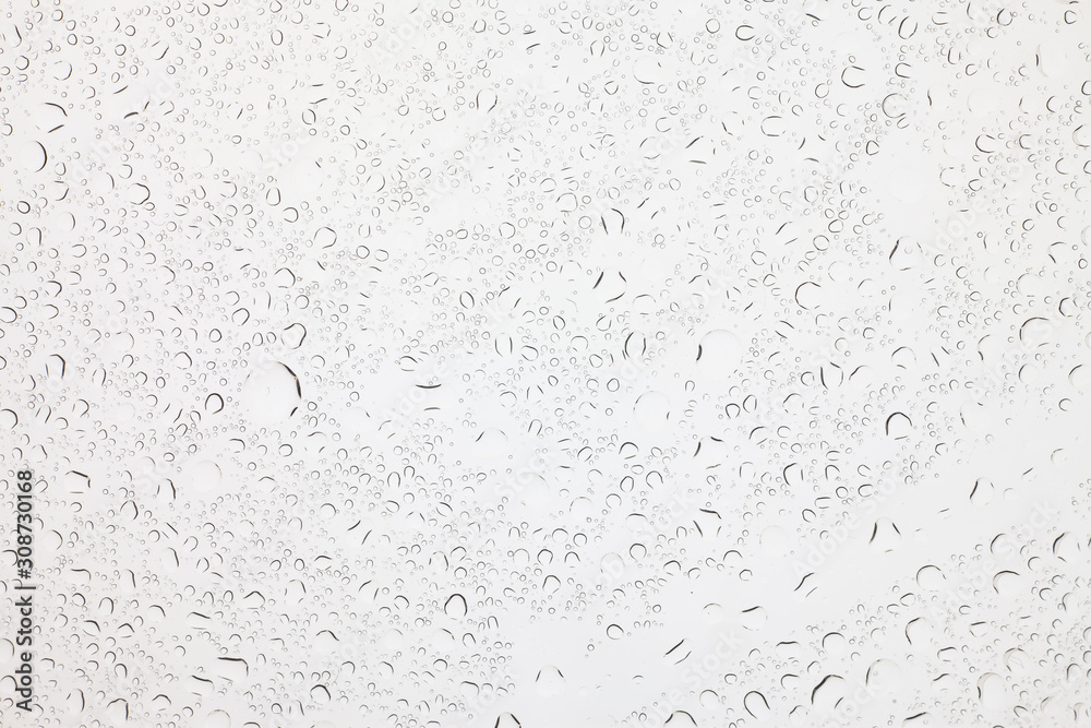 Rain droplets on glass background, Water drops on glass. Rain droplets on glass background, Water drops on glass.