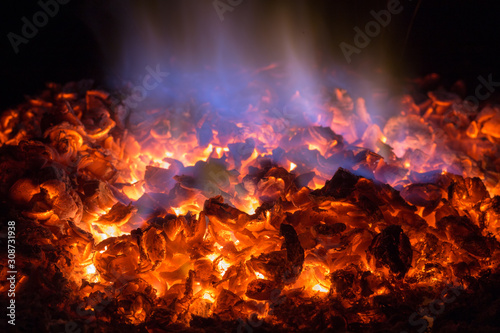 Texture embers closeup. Embers after a fire.