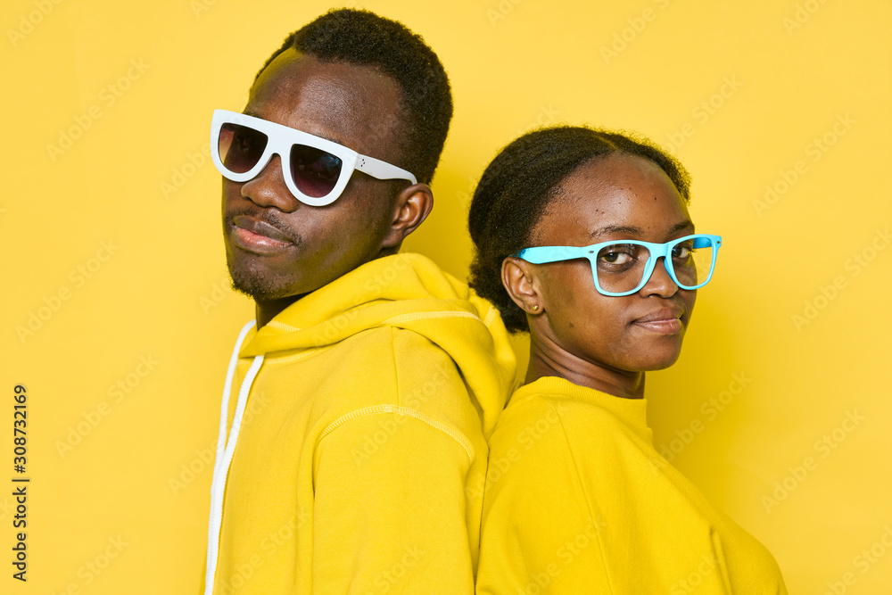 man and woman in sunglasses